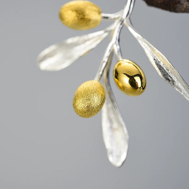 Aros Con Diseño Hojas Y Frutos de Olivo De Plata.