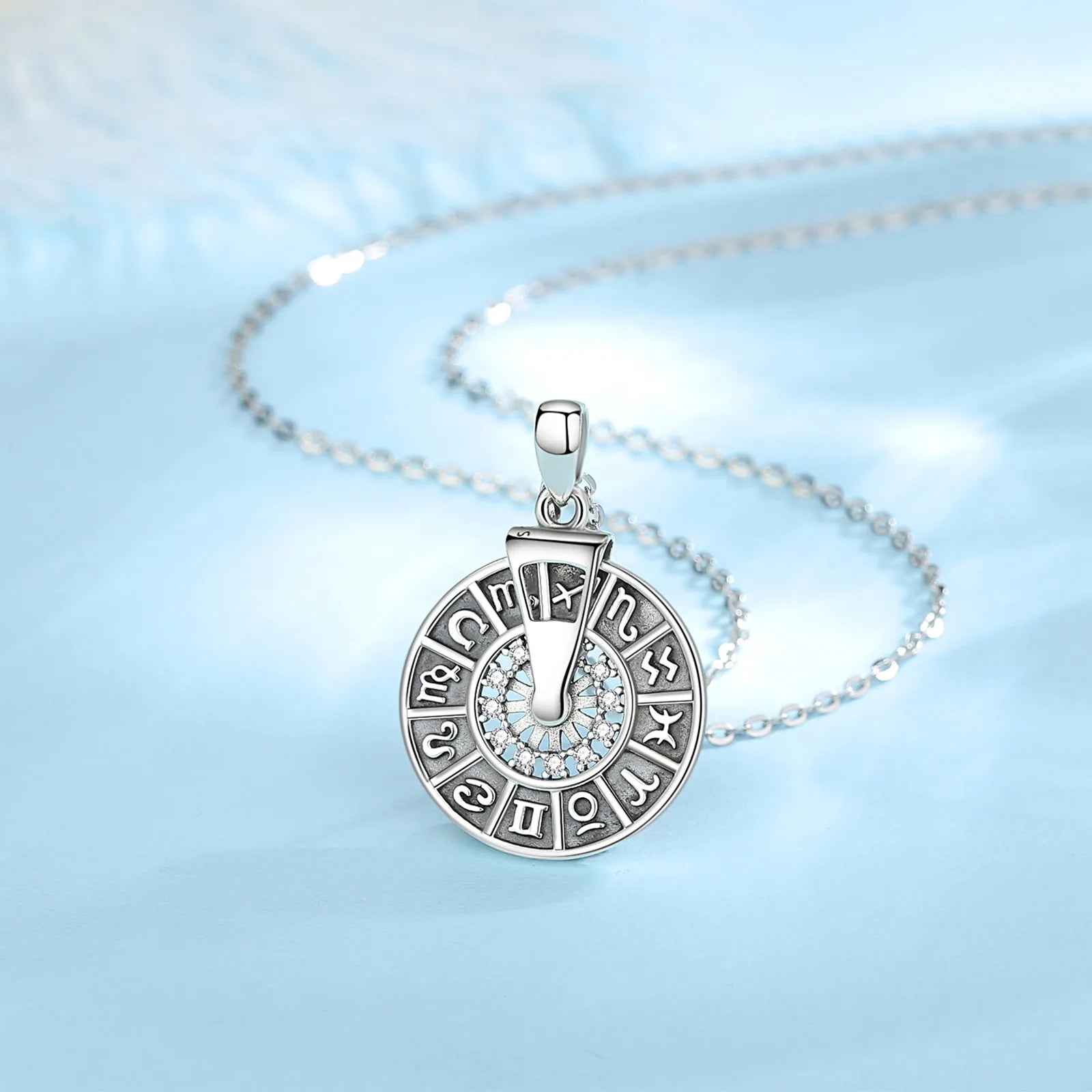 Colgante Signos de Zodiaco Rotativo de Plata .